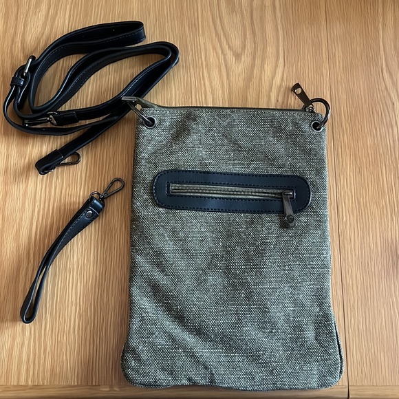 Olive green canvass cross body bad with studs.  Wristlet handle too. - Picture 2 of 2